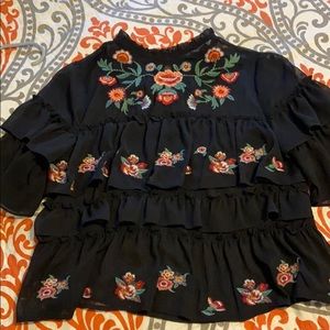 Black blouse with floral embroidery